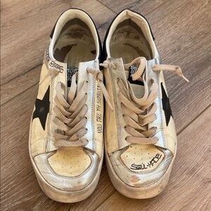 Golden Goose Stardan model—Cream and Black Distressed Sneakers.